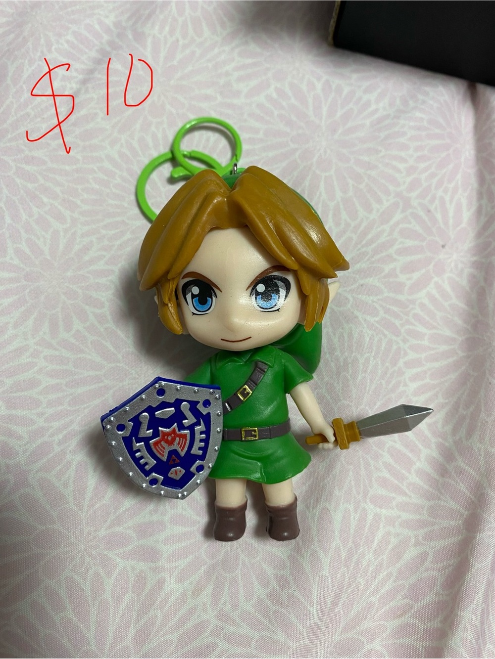 Green Hero Keychain Figure with Blue Shield and Sword
